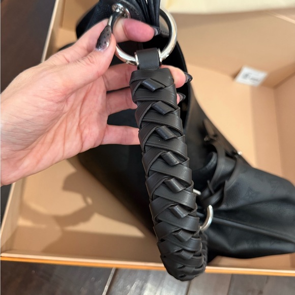 Louis Vuitton Black Monogram Embossed Braided-Handle Hobo - Picture 5 of 14